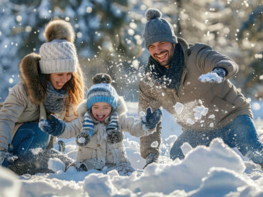 Happy family playing snow winter fun Happy family playing snow winter fun